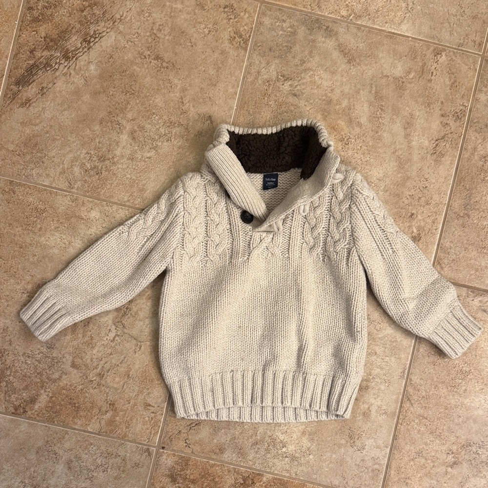 Baby GAP super cute cream cable knit sweater with brown patches on sleeves.